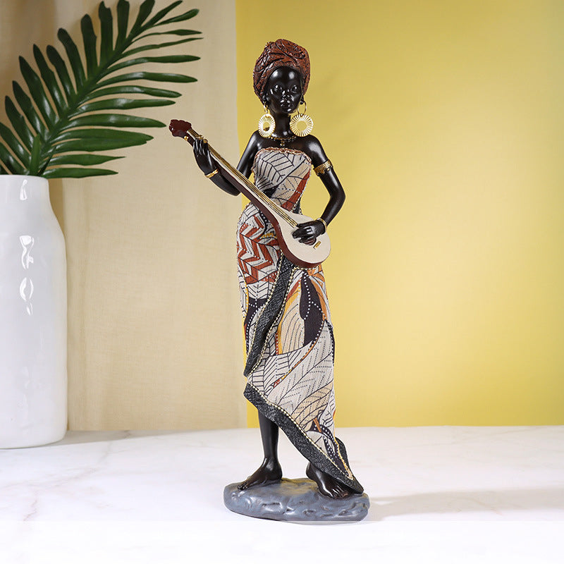 Hjemix | Afrikansk kvinnelig musiker skulptur