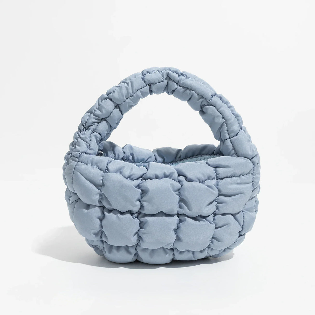 Hjemix | Livlig quiltet rund mini bag