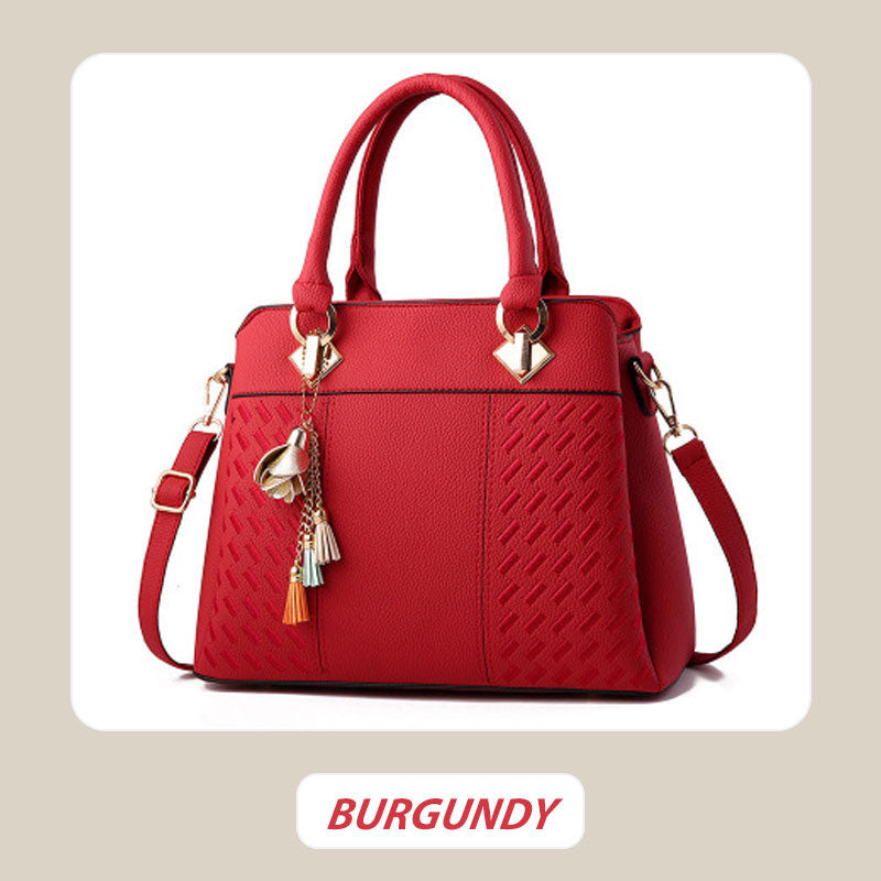 Hjemix | Elegant dameveske med dusk-anheng