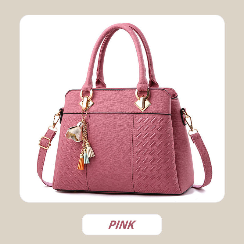 Hjemix | Elegant dameveske med dusk-anheng