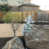 Hjemix | Statue av sittende fe i hagen