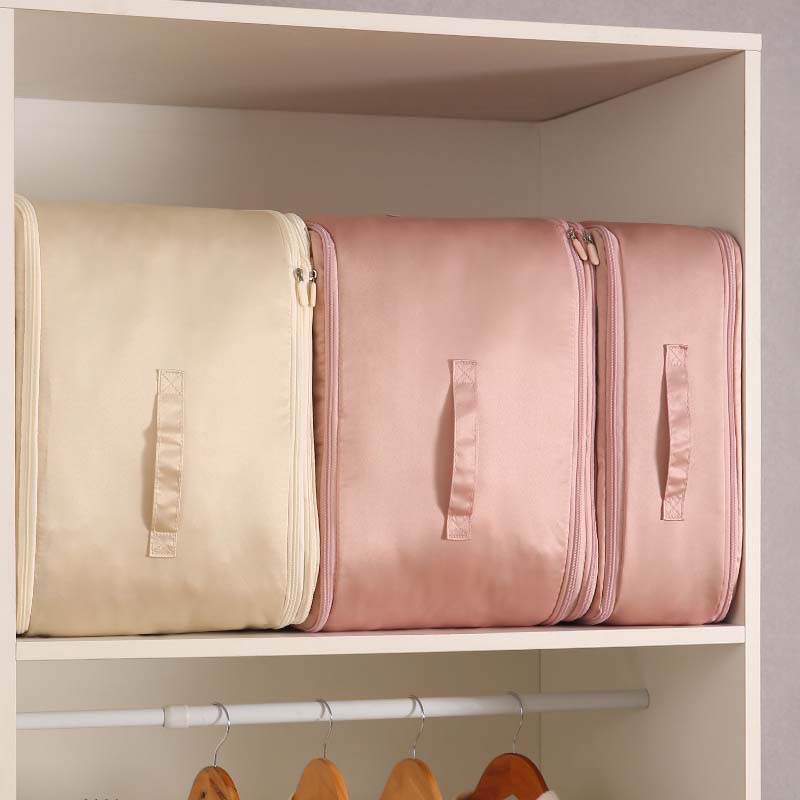 Hjemix | Ultra plassbesparende selvkomprimerende organisator