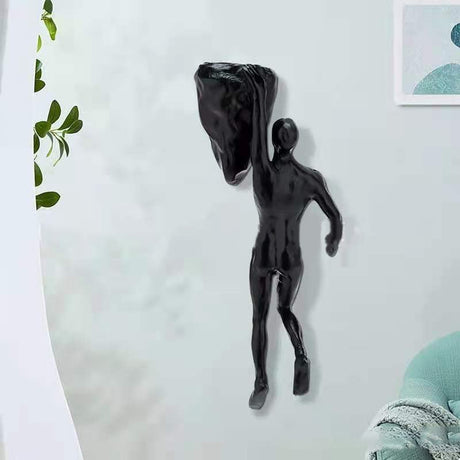 Hjemix | Klatrevegg hengende statuer
