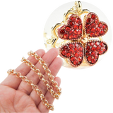 Justerbart halskjede med 4 kløverhjerter