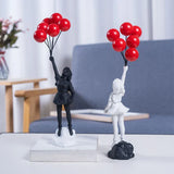 Hjemix | Skulptur av en jente med ballong i Banksy-stil for borddekorasjon og kreativ stuedekorasjon