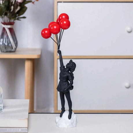 Hjemix | Banksy flygende ballongjente statue