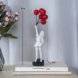 Hjemix | Banksy flygende ballongjente statue