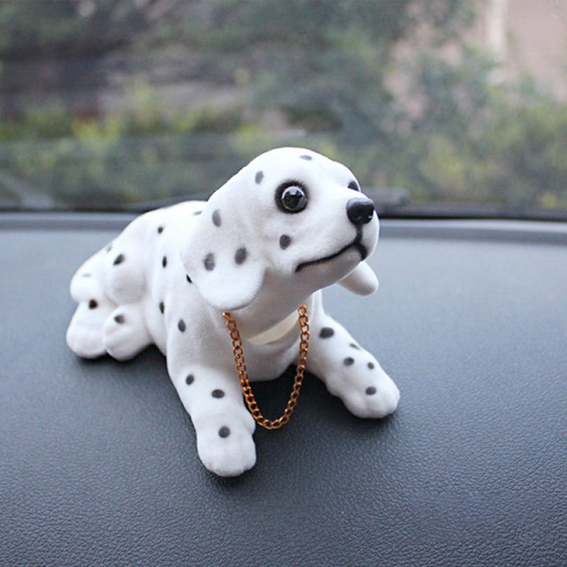 Hjemix | Biltrailer med vaklende hode hund