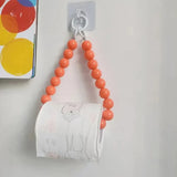 Hjemix | Innovativ hengende toalettpapirholder med perler