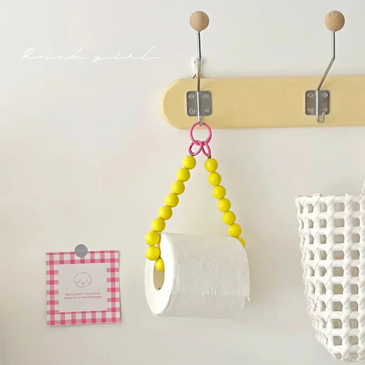 Hjemix | Innovativ hengende toalettpapirholder med perler
