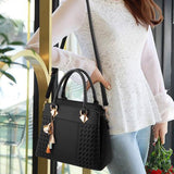 Hjemix | Elegant dameveske med dusk-anheng