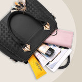 Hjemix | Elegant dameveske med dusk-anheng