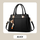 Hjemix | Elegant dameveske med dusk-anheng