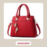 Hjemix | Elegant dameveske med dusk-anheng