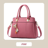 Hjemix | Elegant dameveske med dusk-anheng