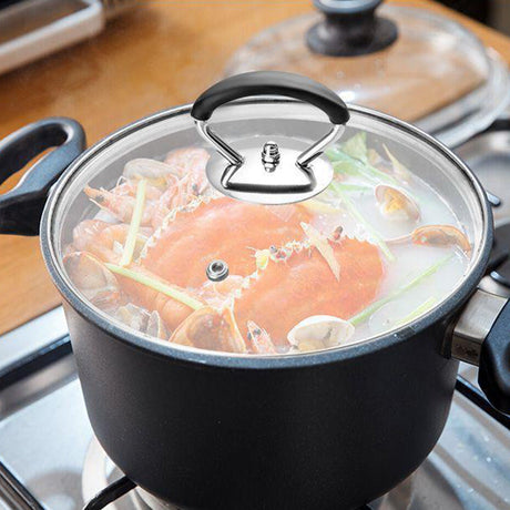 Hjemix | Silikongryteklokke med anti-sprutknott som holder håndtaket