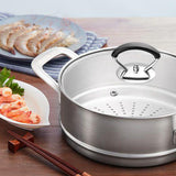 Hjemix | Silikongryteklokke med anti-sprutknott som holder håndtaket