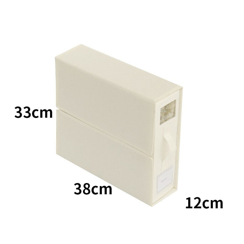 Hjemix | Sammenleggbar sengetøyholder